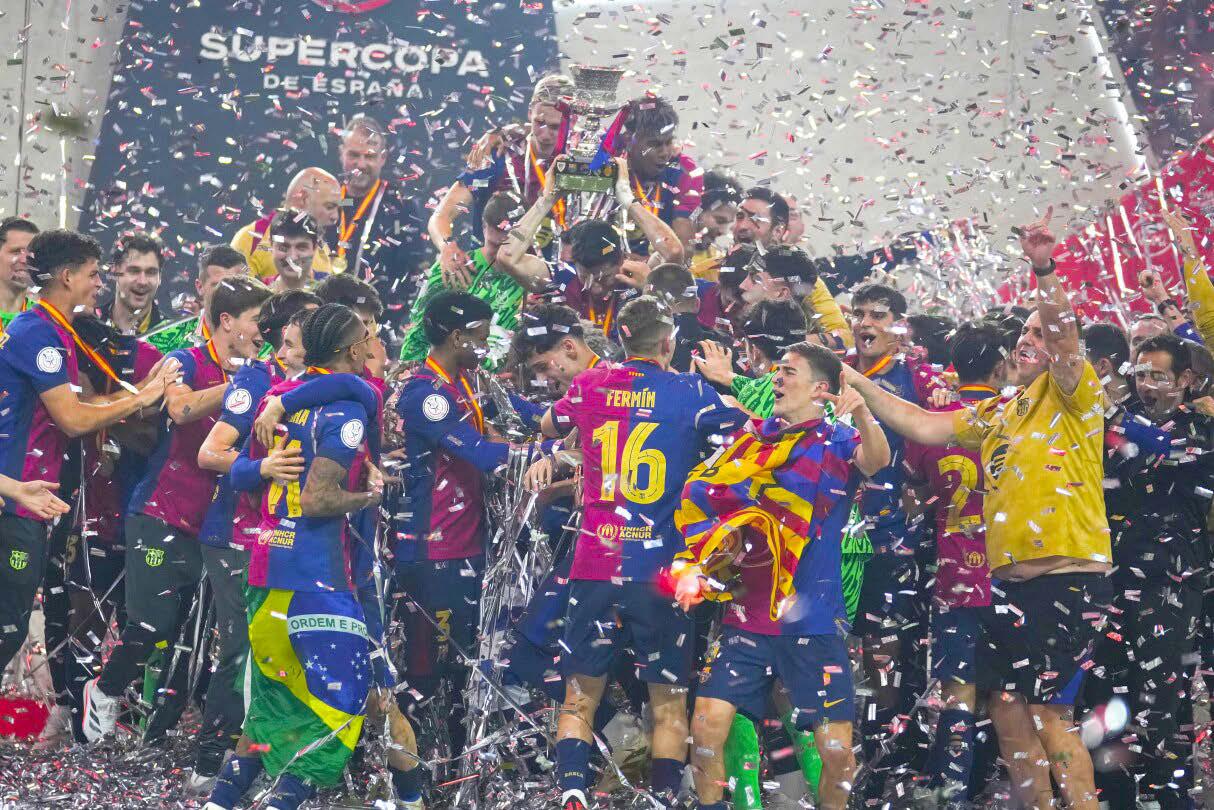 BARCELONA ROUTS REAL MADRID AGAIN TO WIN SPANISH SUPER CUP